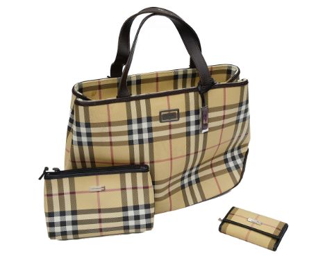 A Burberry handbag, make up bag and key walletall with the classic black and red check against a beige ground, the handbag wi