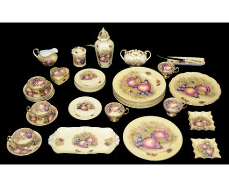 A collection of Aynsley Orchard Gold chinacomprising eight 26.6 diameter dinner plates, six tea cups and saucers, six tea pla