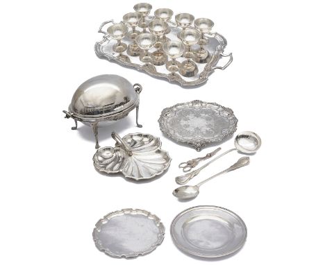 A collection of Victorian and later electroplated itemscomprising a foliate engraved circular salver with shell and scroll bo