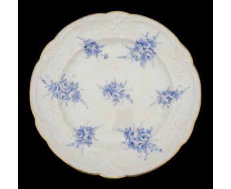 A Nantgarw porcelain moulded plate c.1815-18moulded scroll, flower and ribbon tied border, London decorated with seven sprays