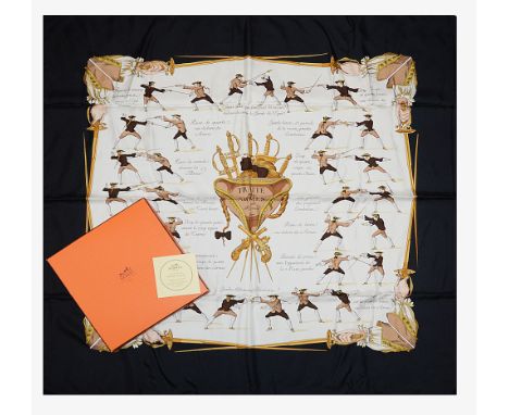A black, brown and cream Hermes vintage silk 'Fencing scarf'with central section printed with images of fencing positions, wi