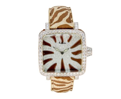Kutchinsky. An 18ct white gold diamond and sapphire set quartz wristwatch Convex, Limited edition no. 002 Quartz movement, pa