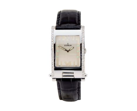 Corum. A stainless steel quartz wristwatch Tabogan, Reference 64.151.20, Case no. 593945 Quartz movement Cal: 820, movement n