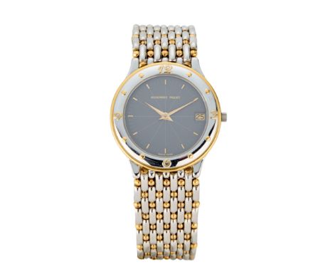 Audemars Piguet. A stainless steel and gold quartz calendar bracelet watch  Meridian, C-28756, Movement number 262972, Circa 