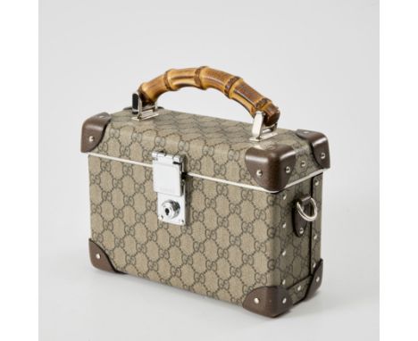 Gucci. Globe Trotter autumn/winter 2018-19 collection, of monogram leather on the exterior of the bag, further with brown lea
