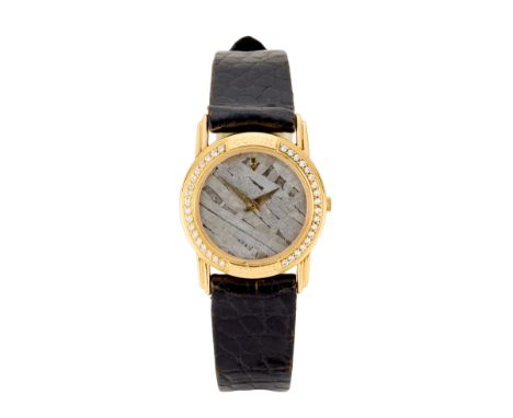 Corum. A small sized 18ct gold and diamond set quartz wristwatch with meteorite dial Circa 1990, Case no. 495348, Movement no