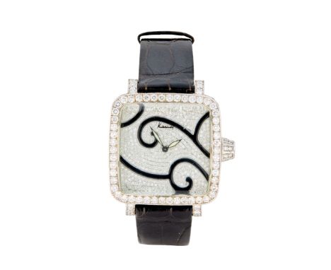 Kutchinsky. An 18ct white gold diamond and green sapphire set quartz wristwatch Convex, Limited edition no. 001 Quartz moveme