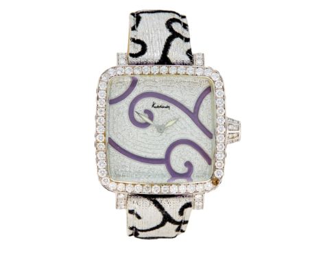 Kutchinsky. An 18ct white gold diamond and amethyst set quartz wristwatch Convex, Limited edition no. 005 Quartz movement, pa
