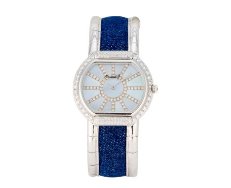 An 18ct gold and diamond quartz bangle watch Quartz movement, tonneau shaped dial with brilliant cut diamond hour segments, t