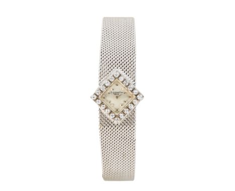 Ebel. An 18ct gold and diamond set back winding bracelet watch with  Numbered 8059/125, Circa 1960 Jewelled back winding move