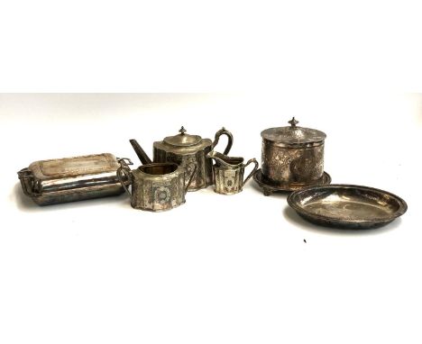 A lot of six silver plated items to include a teapot, serving dishes and a Walker &amp; Hall biscuit barrel, 19cmH 