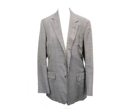 A single breasted light grey two piece suit, tailored by Ron Morley, having two pairs of trousers, one with 1.5" turnups, som