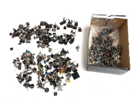 A large quantity of vintage 1980s Games Workshop Warhammer figurines, marked to base 1984 and 1987, plastic and metal