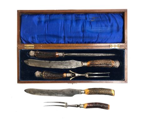 A mahogany cased steel and antler carving set by HJ Deacon, Swindon, with silver collars; together with a further similar Vic