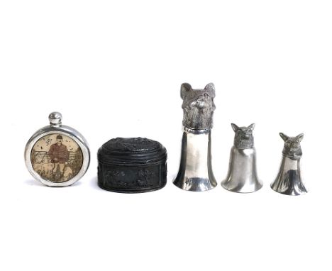 Three fox mask stirrup cups, the largest 15.5cm high; hip flask; pewter casket depicting hunting scenes 