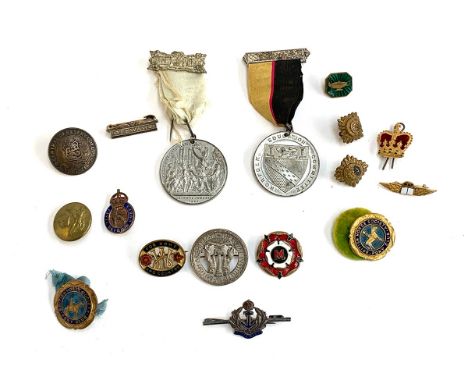 A small quantity of medals and badges to include 1945 Defence Medal; Edward VII 'God Save The King' 1902 coronation medal; Th