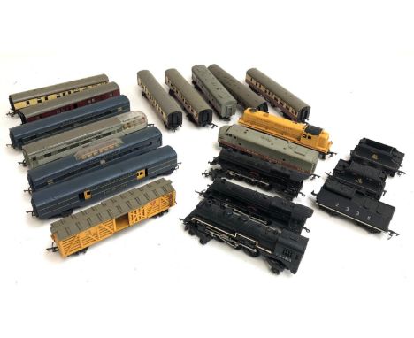 A quantity of Triang railways locomotives, carriages. wagons and accessories to include Princess Elizabeth, 5007, T. R. 2335,