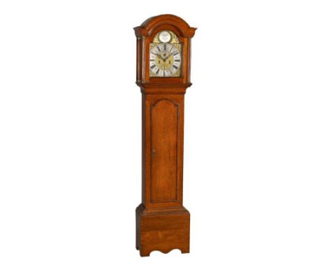 An oak longcase clock by Richard Carter, High Wycombe, with eight-day bell striking movement, the 12inch brass dial with silv