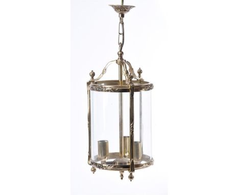 A cylindrical glass and gilt metal lantern, approx. 40cm high, together with a five arm gilt metal chandelier 