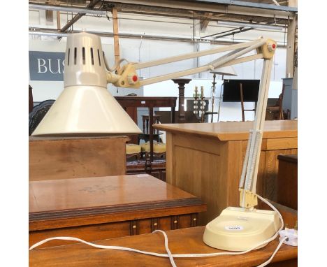 A white anglepoise style lamp 