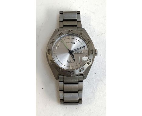 A gents Citizen eco-drive Titanium watch 