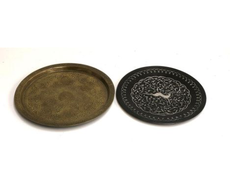 A copper tray with inlaid silver pattern and central oryx, engraved text to back and 22 January 1976, 32cmD; and a vintage br