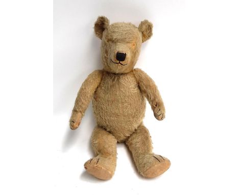 A vintage teddy bear with articulated limbs and head, Steiff style, approx. 60.5cmL 