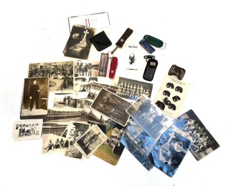 Two Swiss Army knives; together with a Billabong pocket knife; a small collection of black and white photos; vintage V. Benja