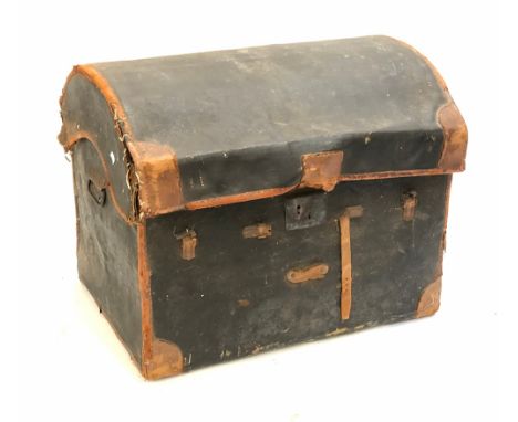 A large 19th century domed travel trunk, canvas and leather over a wicker frame, 'from H. Sheerman and Son, Box, Trunk, and P