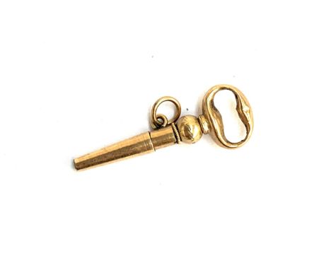 A Victorian yellow metal ratchet pocket watch key, 2.6cm long 