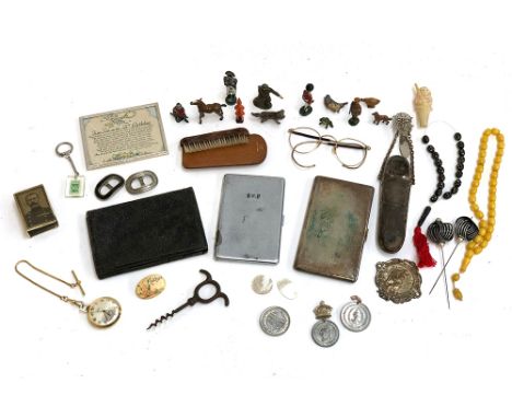 A mixed lot of interesting things to include lead soldiers and animals; cigarette cases; Lord Kitchener matchbox case; Green 