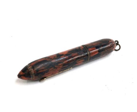 A vintage miniature travel fountain pen, red and black marbled bakelite case, the nib marked 'Warranted Rust Proof', 8cmL 