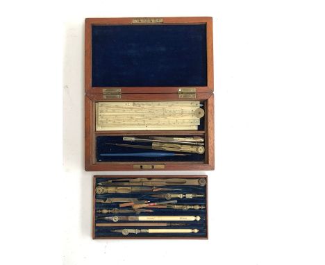 A set of drawing instruments marked Elliott, in a mahogany case with brass plaque inlay; together with a vintage Uno Deluxe t