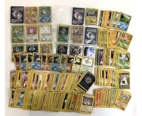 A quantity of Pokemon cards to include Base Set, Base Set 2, Gym Heroes, Jungle, Fossil, Team Rocket. This lot includes holos