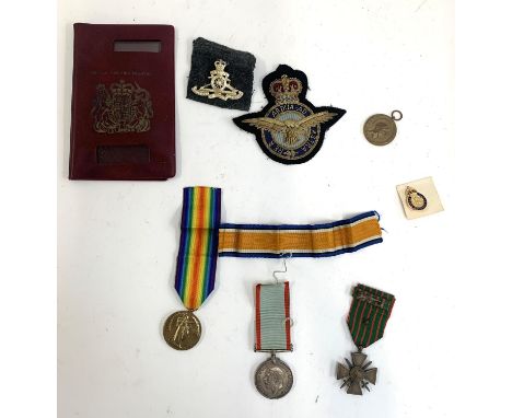 A pair of World War One medals awarded to W. E. B. Blacker, F. A. N. Y. C., comprising War and Victory Medals, together with 