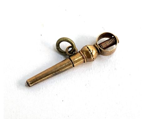 A Victorian yellow metal ratchet pocket watch key, 2.8cmL 