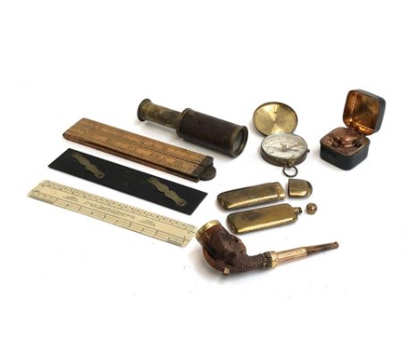 A mixed lot to include a miniature brass and leather telescope; German compass; a leather clad travel inkwell; miniature bras