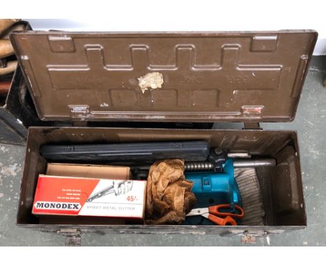 A vintage metal ammo box, containing a Black &amp; Decker drill stand, sheet metal cutter, etc 