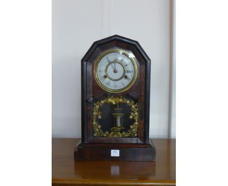 A 19th Century American beech shelf clock