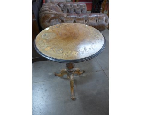 A Victorian inlaid walnut tripod table