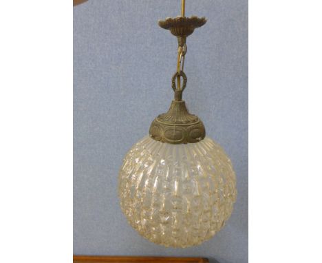 A gilt metal and glass ceiling light
