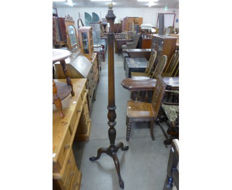 A mahogany standard lamp