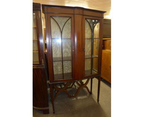 An Edward VII inlaid mahogany display cabinet (lacking glass to one side)