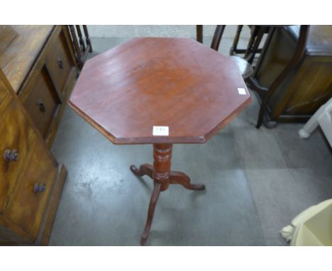 A Victorian beech tilt top tripod table