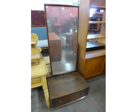 An Ercol cheval mirror