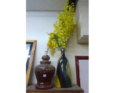 A glazed pottery table lamp and a vase