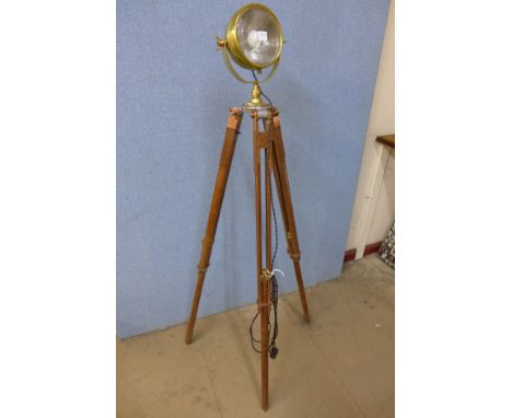 A Raydyot brass light on later theodolite tripod stand