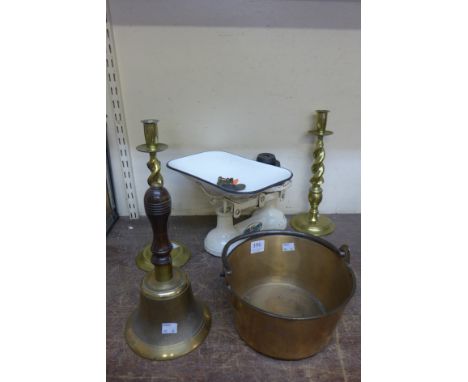 A pair of brass candlesticks, set of scales, brass jam pan, enamel dish and a brass bell