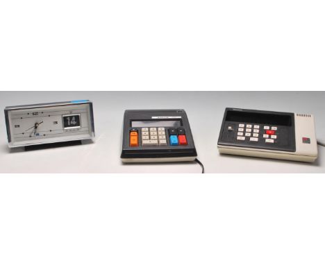 A good collection of 20th century retro vintage desktop items to include a Shanghai flip date alarm clock having windup movem