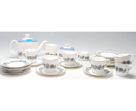 A vintage retro 20th Century Royal Doulton fine bone china tea service comprising of cups, saucers, side plates (trios) a tea